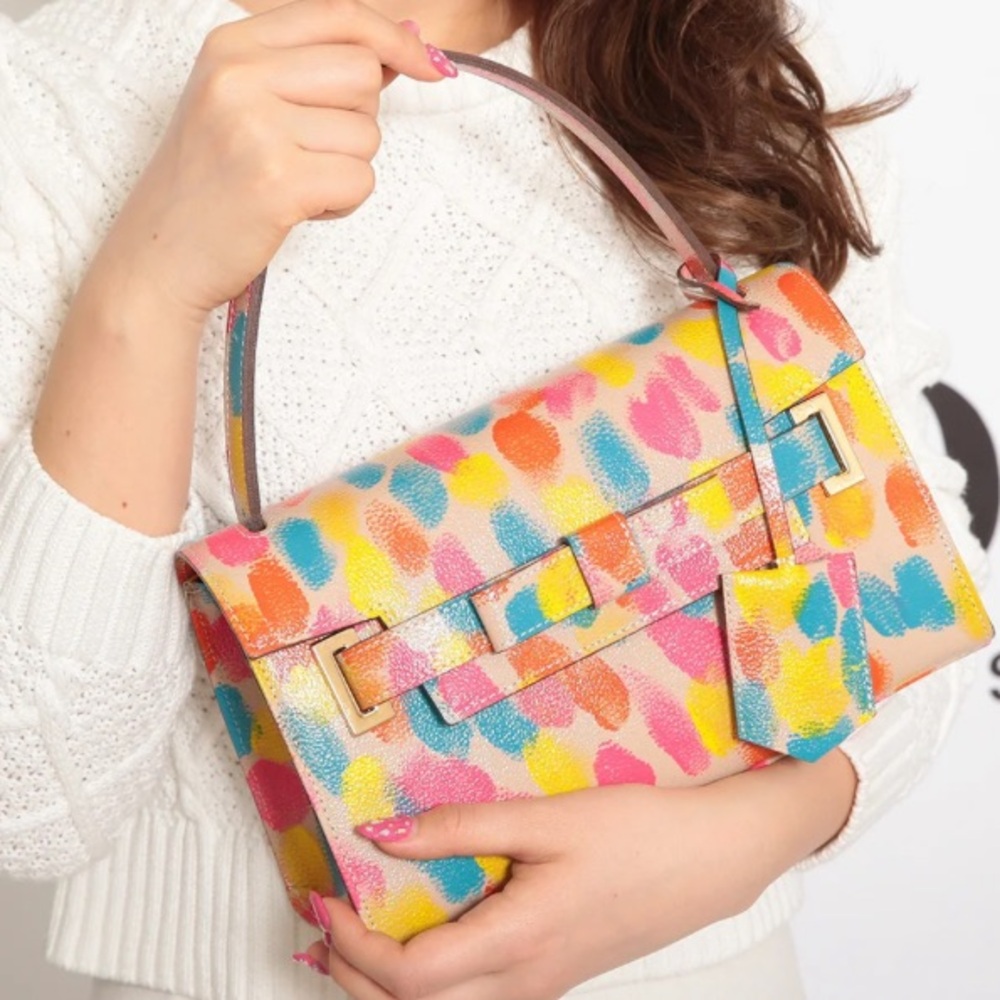 Sellling a Samantha Thavasa painted purse.